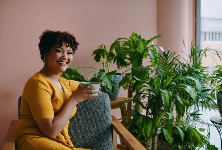 Image of an office worker drinking coffee