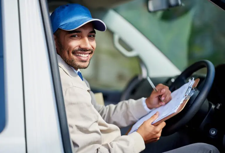 Image of a maintenance worker in a van
