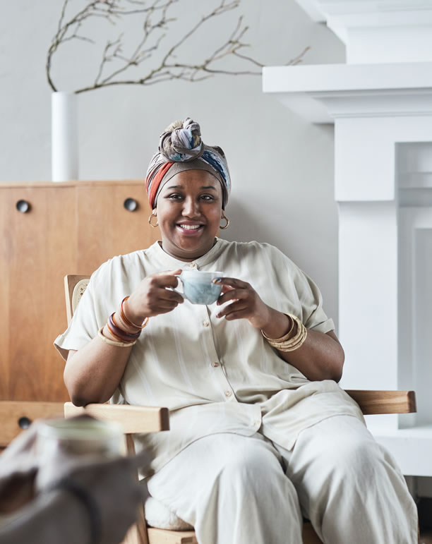 Image of a woman enjoying an espresso